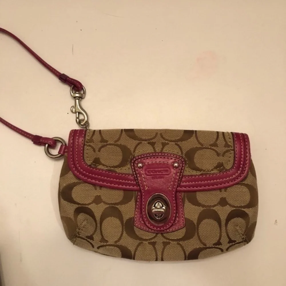 Coach signature brown dark pink leather wristlet